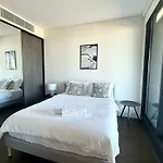 New Olympic Park 2 Bedroom Condo -Pool Gym Parking